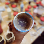 Participants painting 3D printed ceramics during a sound bath workshop in Berlin