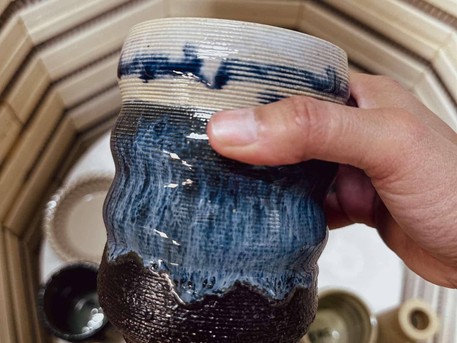Participants painting 3D printed ceramics during a sound bath workshop in Berlin