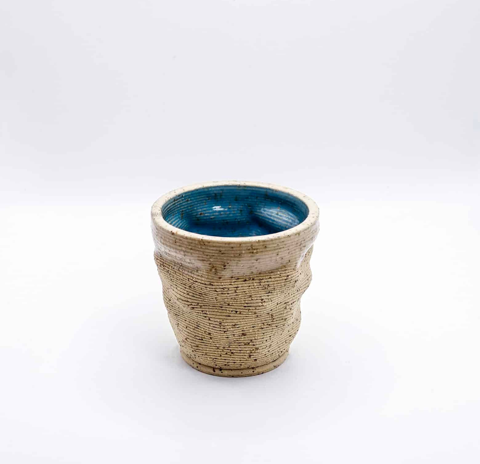 3D printed ceramic espresso cup with layered texture in sand beige – Migration of Matter