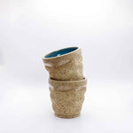 3D printed ceramic espresso cup with layered texture in sand beige – Migration of Matter
