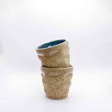 3D printed ceramic espresso cup with layered texture in sand beige – Migration of Matter